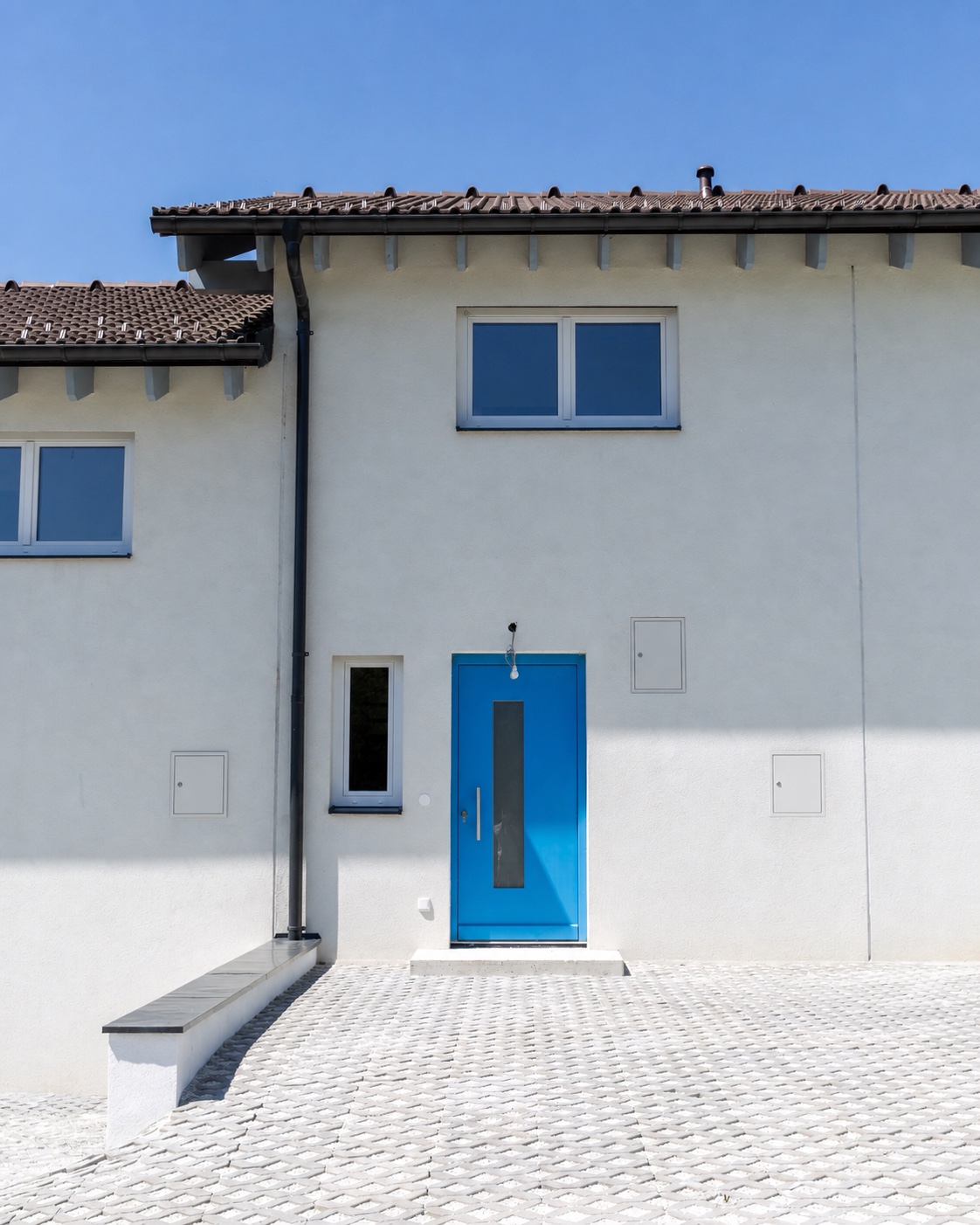 Fassadenvisualisierung Haus 336 mit blauem Eingang – Darstellung nach Fertigstellung